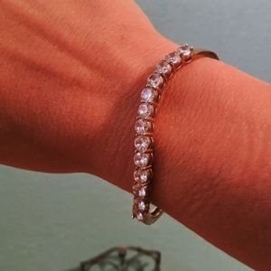 Bracelet not sure of the stones yellow gold